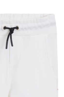 Kids' logo-badge tracksuit bottoms in a cotton blend, White