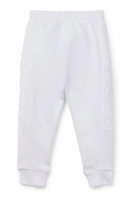 Kids' tracksuit bottoms with embossed logos, White