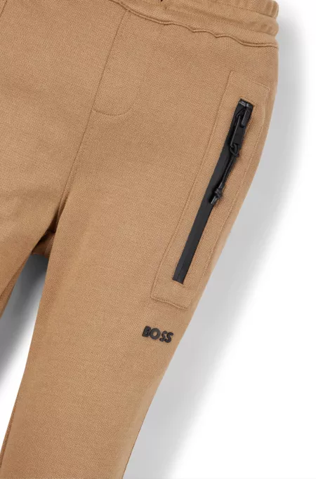 Kids' logo-detail tracksuit bottoms in stretch piqué