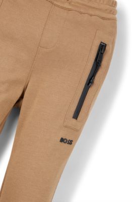 Kids' logo-detail tracksuit bottoms in stretch piqu&eacute;, Brown
