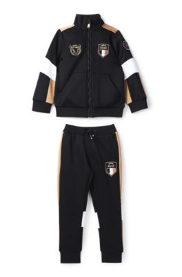 Kids' tracksuit with signature colour-blocking, Black