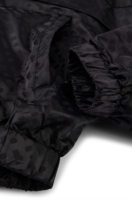 Kids' hooded windbreaker jacket with monogram pattern, Black