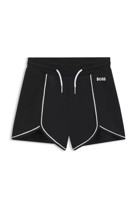 Kids' stretch shorts with logo and piping