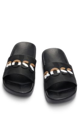 Kids' contrast-logo slides in PVC, Black