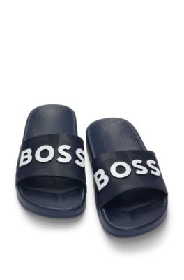 Kids' contrast-logo slides in PVC, Dark Blue