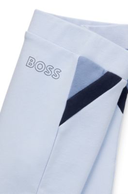 Baby tracksuit in stretch cotton with logo prints, Light Blue