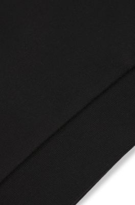 Vestido con capucha para ni&ntilde;os en algod&oacute;n el&aacute;stico con estampado de la marca, Negro