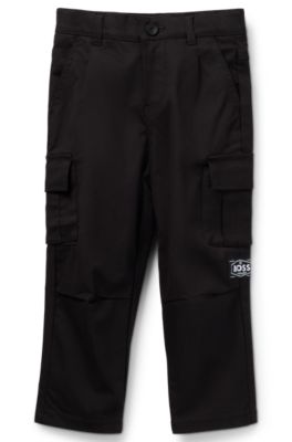 Pantalones tapered fit en sarga de algod&oacute;n el&aacute;stico para ni&ntilde;os, Negro