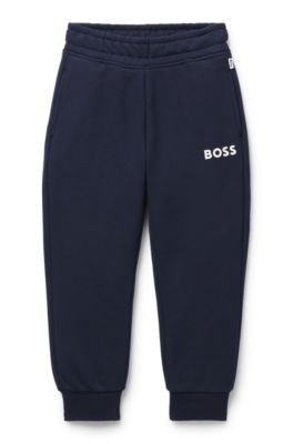 Kids' tracksuit bottoms with logo print, Dark Blue