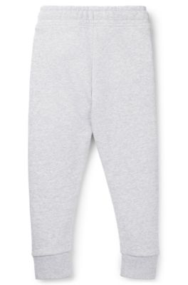 Kids' tracksuit bottoms with vertical logo print, Light Grey