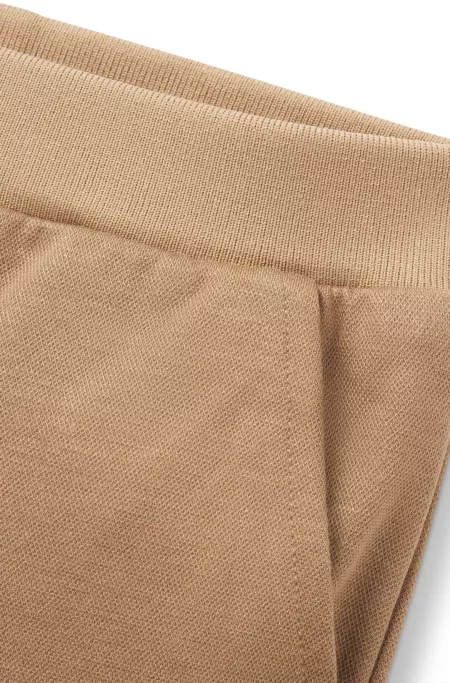 Kids' cargo trousers in stretch piqué with logo label