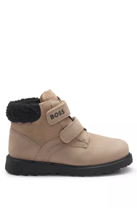 Kids' boots in leather with faux-shearling collar