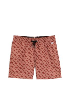Kids' swim shorts with monogram print, Dark Orange