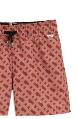 Kids' swim shorts with monogram print, Dark Orange