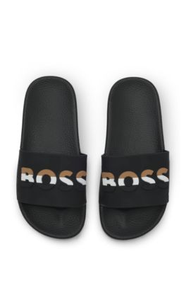 Kids' slides with signature-stripe logo, Black