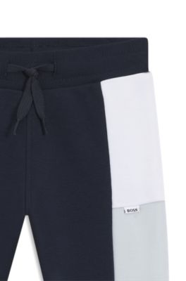 Pantalones de ch&aacute;ndal para ni&ntilde;os en forro polar de algod&oacute;n con bloques de color, Azul oscuro
