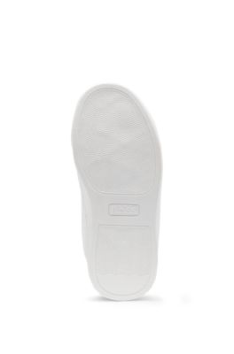 Kids' sneakers in monogram-embossed leather, White