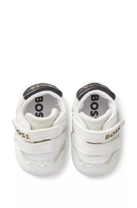 Baby slippers in leather and canvas