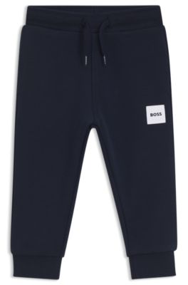 Pantalones de ch&aacute;ndal para ni&ntilde;os de forro polar con etiqueta con logo, Azul oscuro