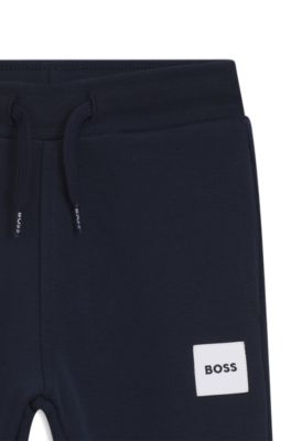 Pantalones de ch&aacute;ndal para ni&ntilde;os de forro polar con etiqueta con logo, Azul oscuro