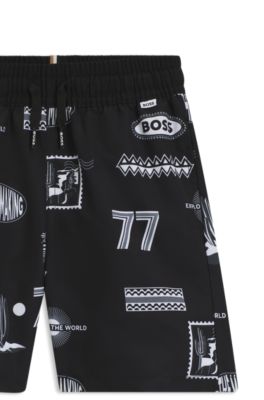 Kids' swim trunks with creative artwork, Black
