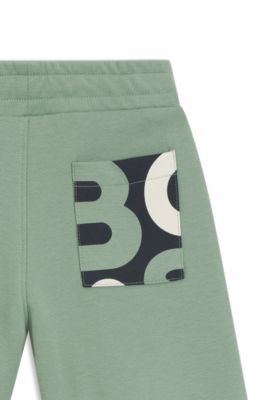 Kids' cotton piqu&eacute; shorts with logo print, Green