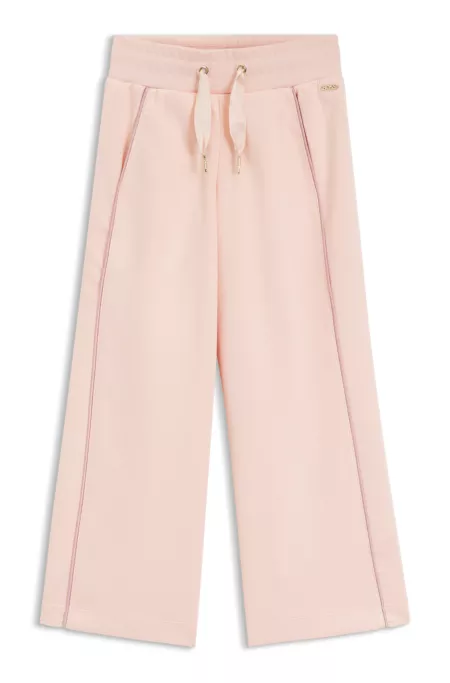 Kids' track pants with logo plaque