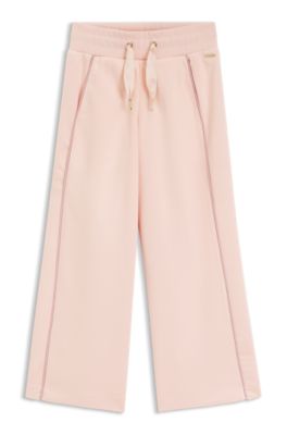 Pantalones de ch&aacute;ndal para ni&ntilde;os con placa con logo, Rosa claro