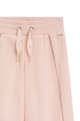 Pantalones de ch&aacute;ndal para ni&ntilde;os con placa con logo, Rosa claro