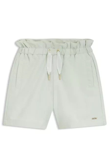Kids' shorts in crinkle fabric with a paperbag waist