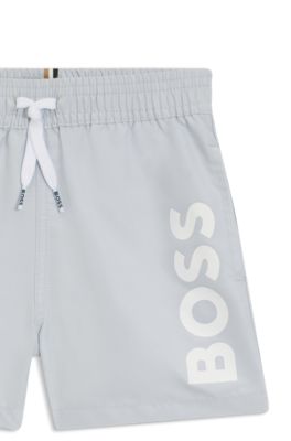 Kids' swim shorts with vertical logo, Light Blue