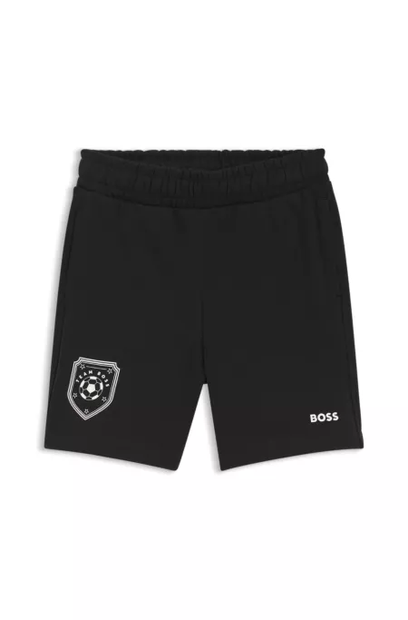 Kids' shorts with soccer artwork