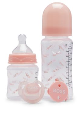 Baby set with dummy, dummy clip and two bottles