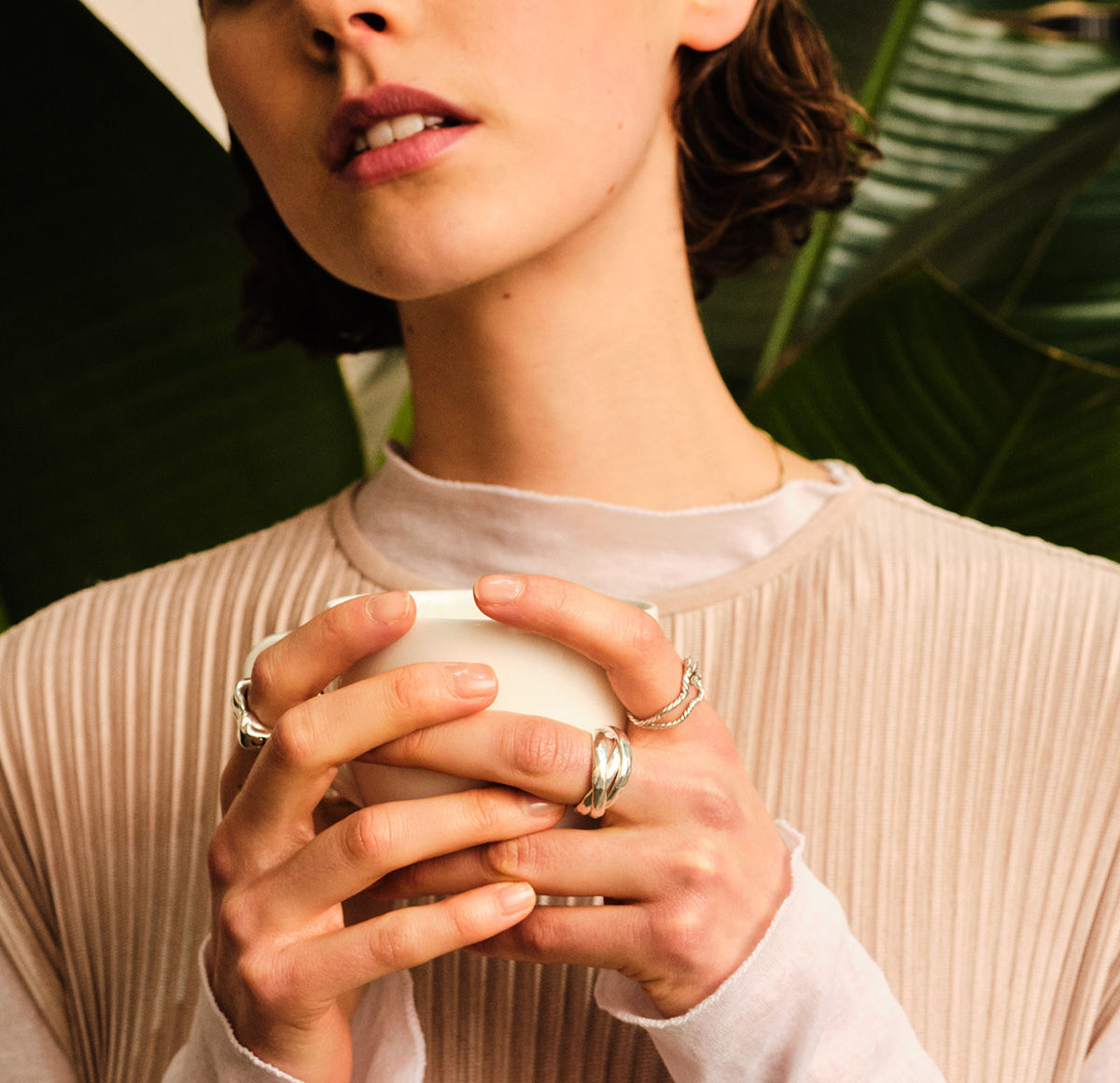 Women is holding a cup 