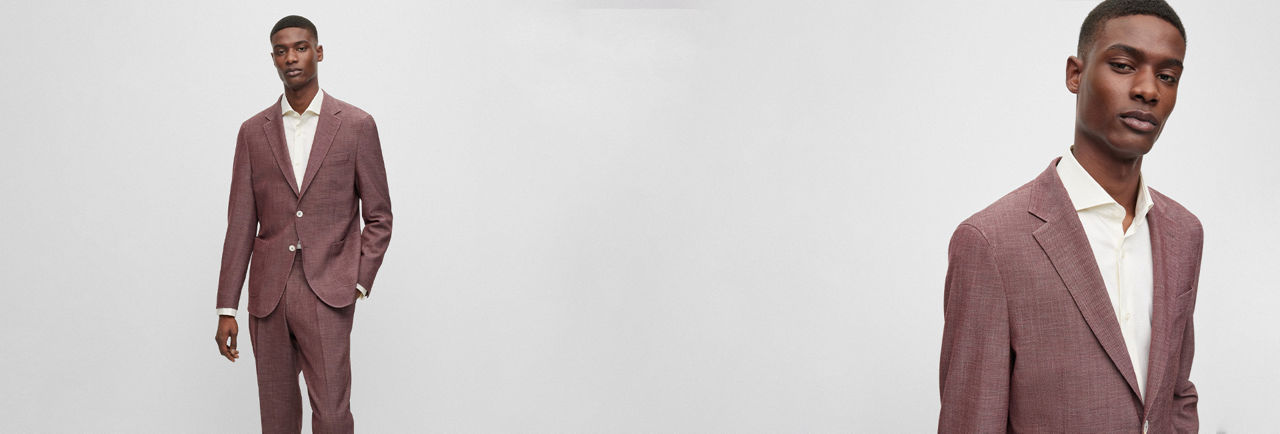 Model wearing a dark red BOSS suit with a white shirt