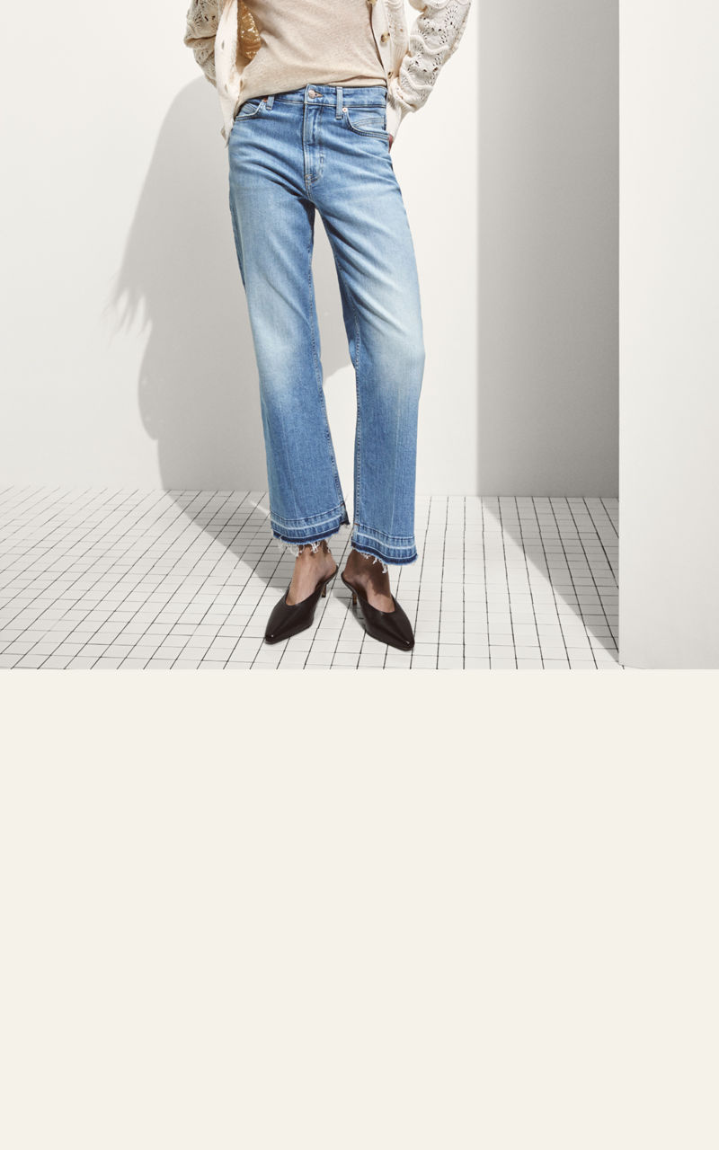 Model wearing a pair of straight fit jeans 