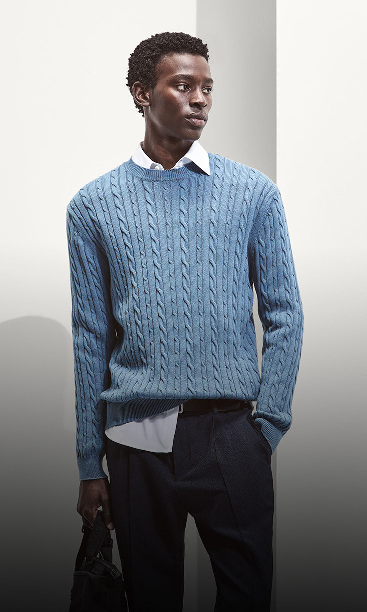 Model wearing timeless luxury outfit by boss 