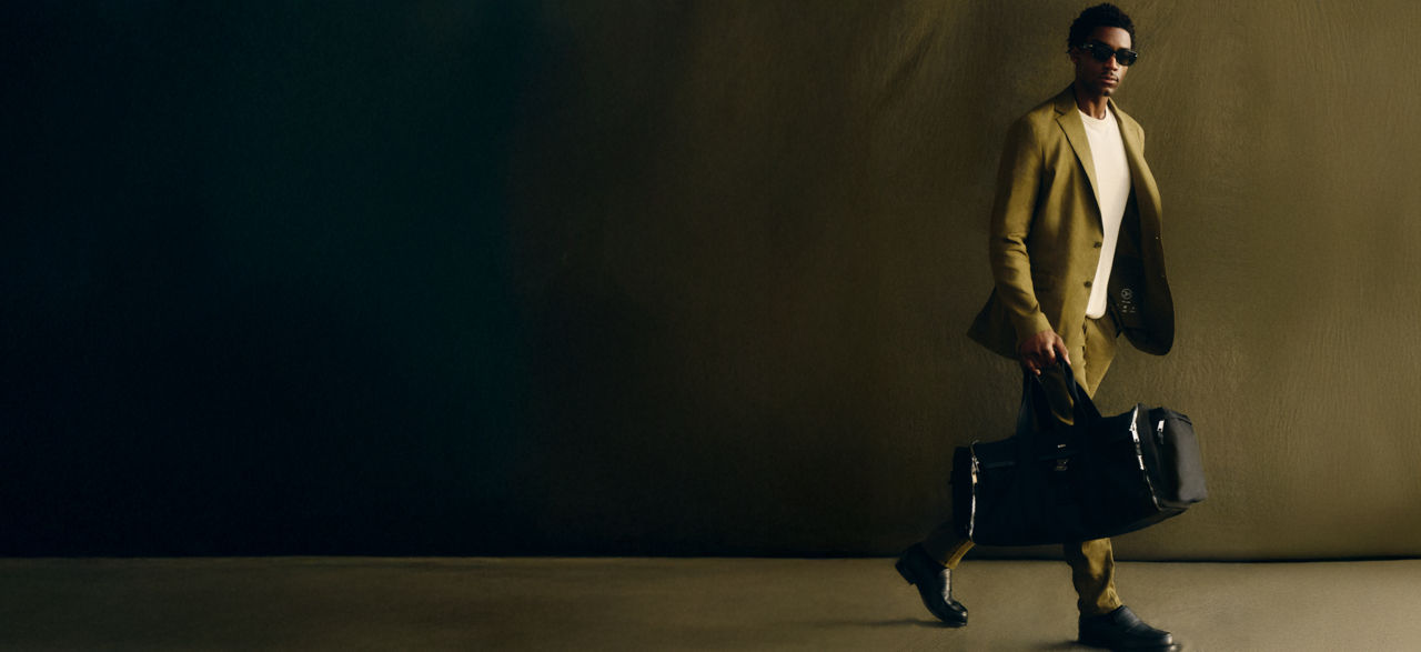 Selection of BOSS Performance suits for men