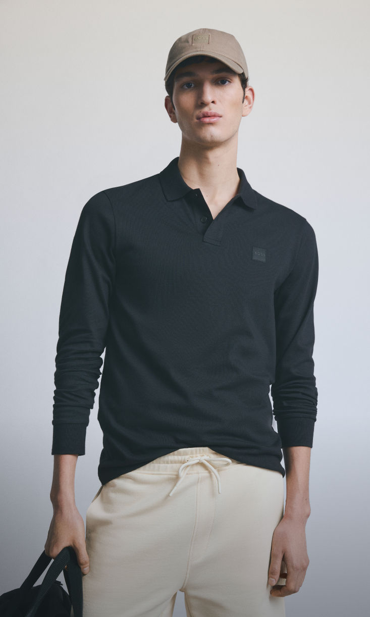 model wearing everyday casual outfit in nude colors by boss