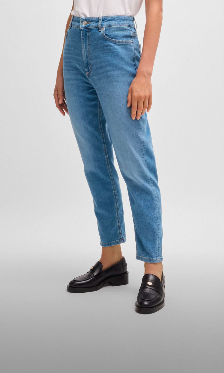 model wearing mom fit denim 