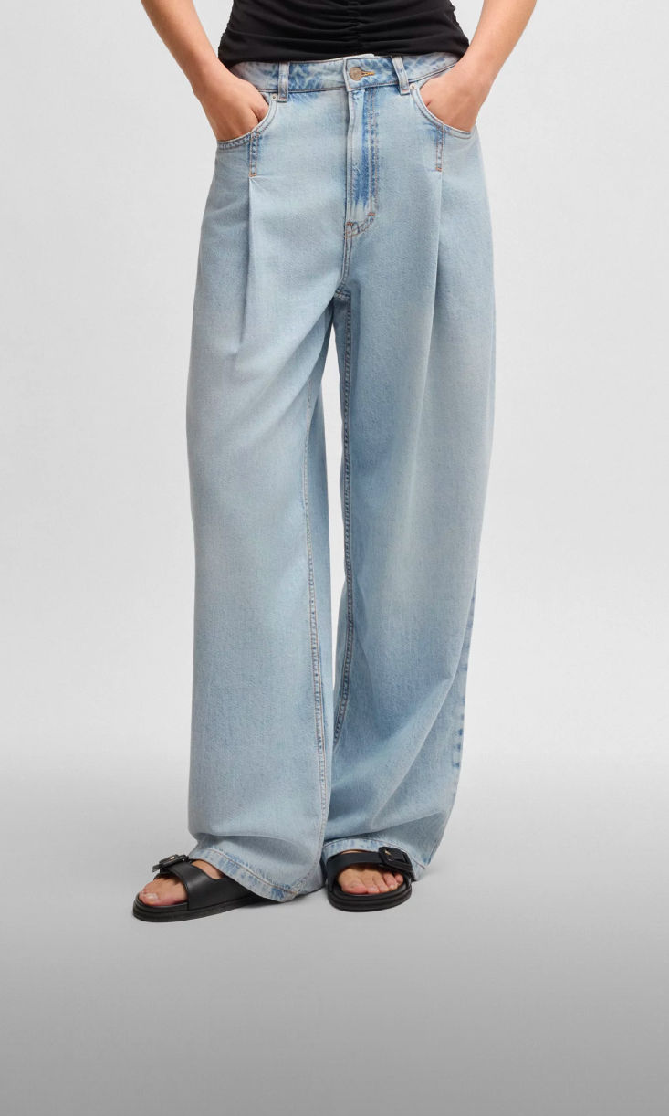 model wearing wide fit denim 