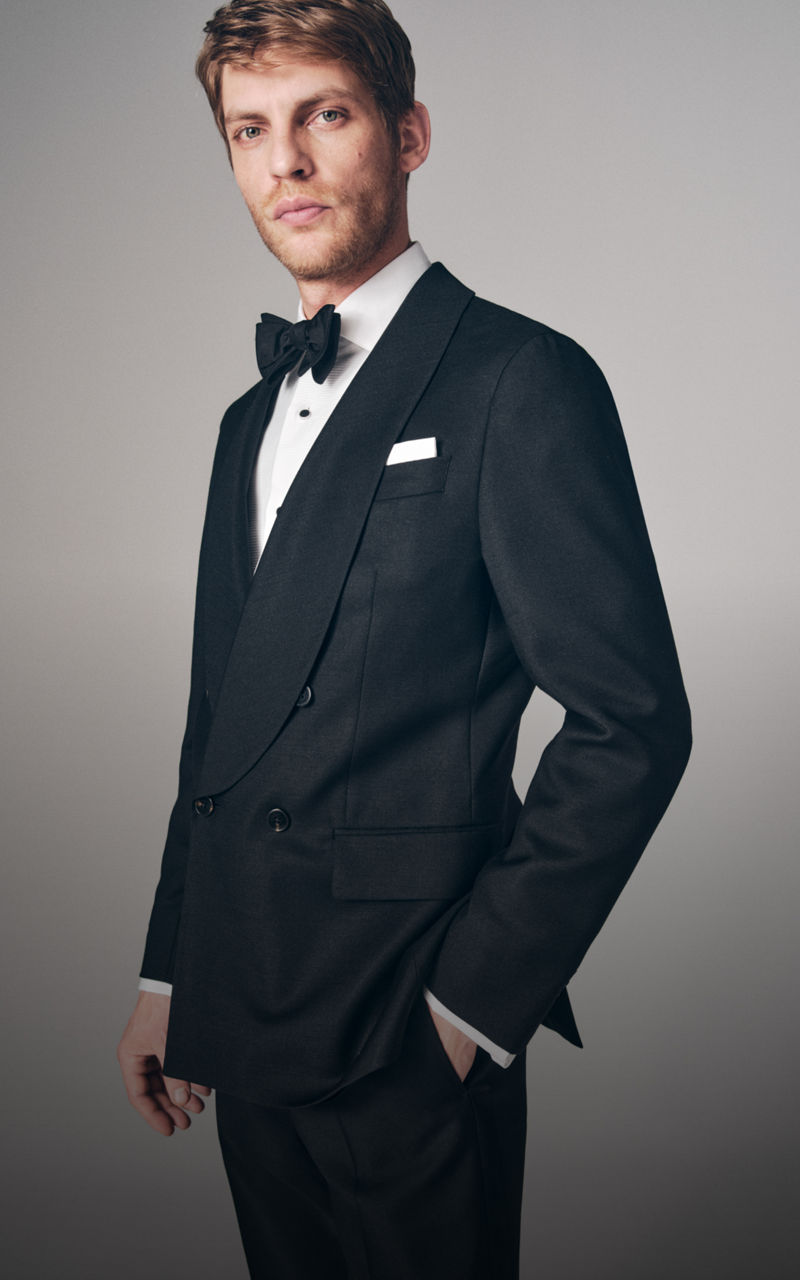 Model wearing a grey heritage suit 