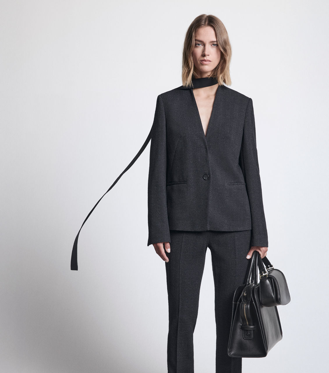 Beige blazer and shorts suit look for women