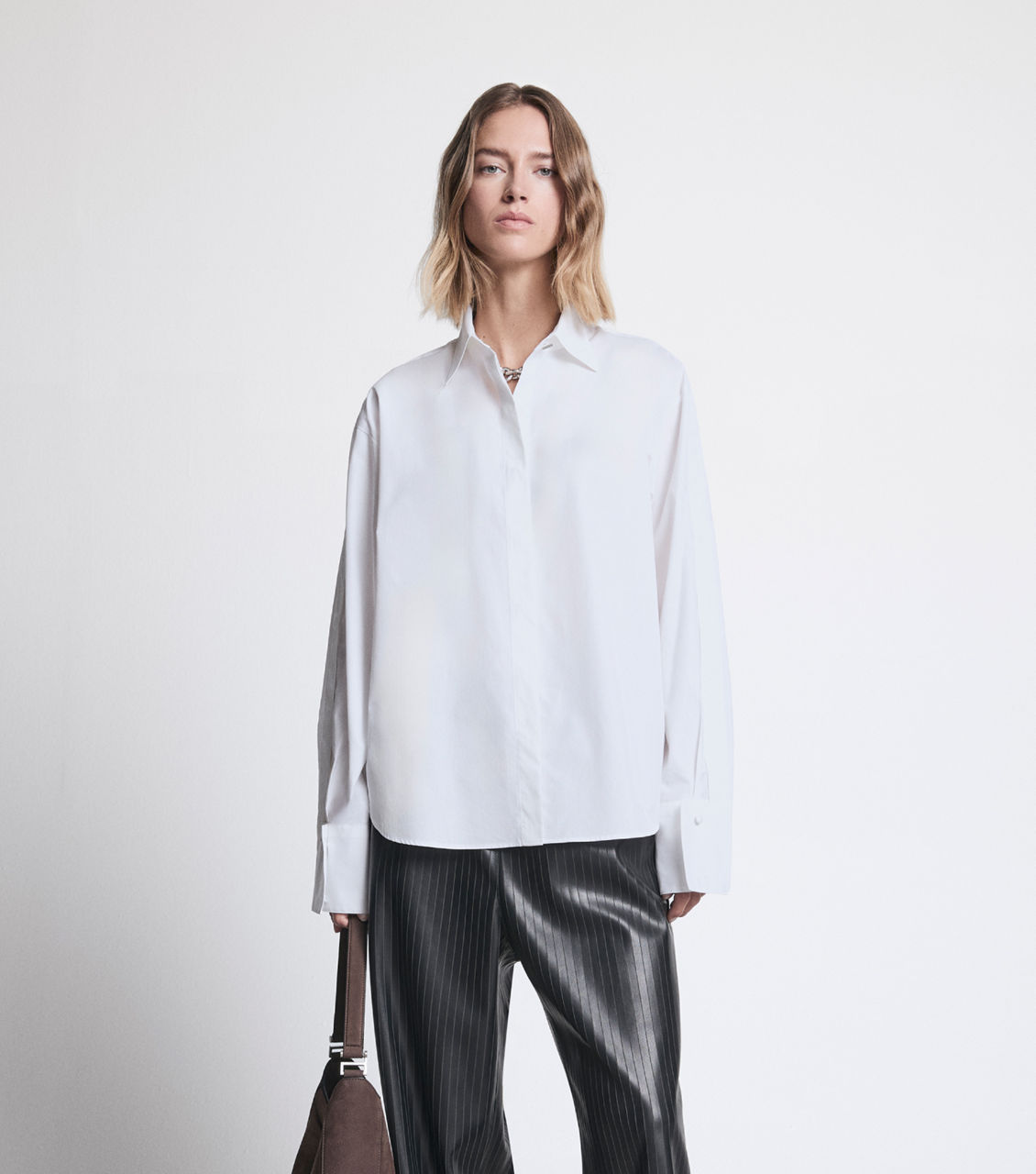 White suit with floral blouse look for women