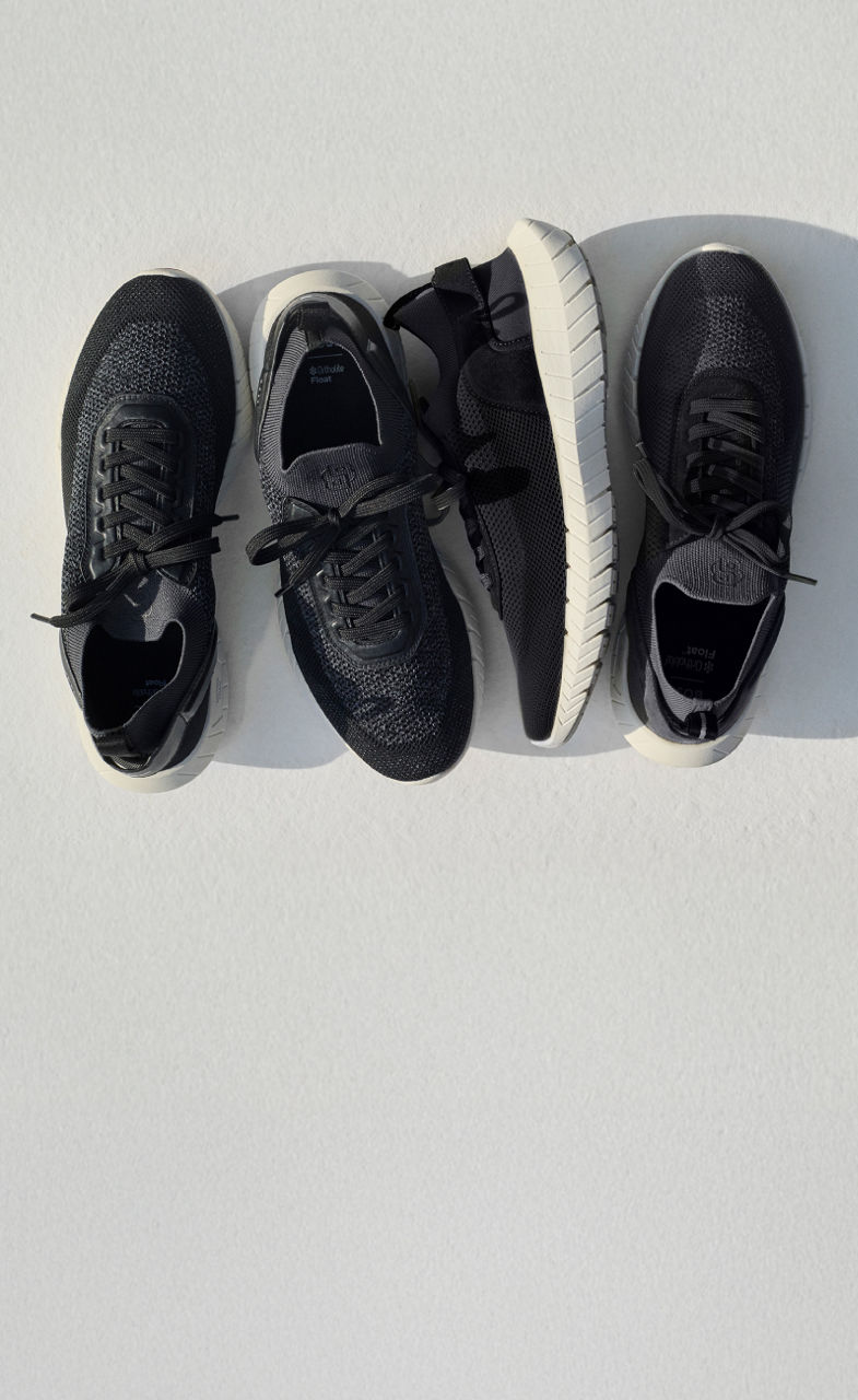variety of the new BOSS Performance Motion Sneakers in dark grey/black