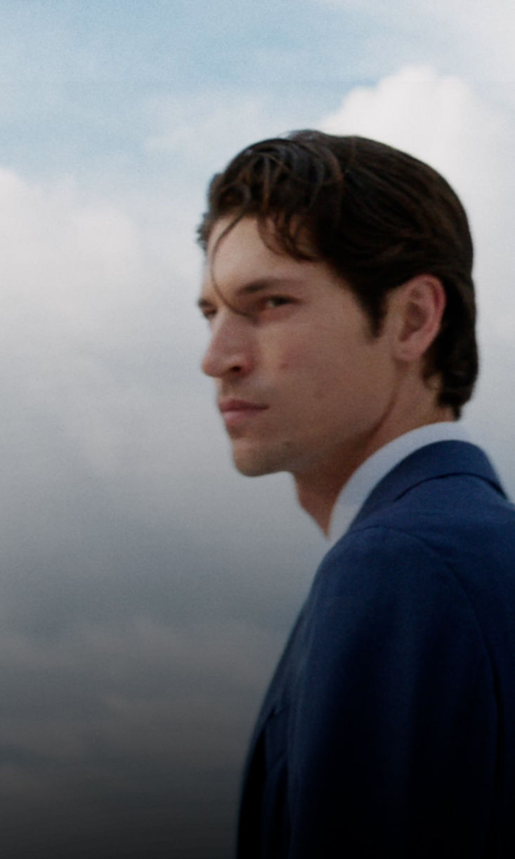 male model in the new BOSS Performance Tech Linen suit