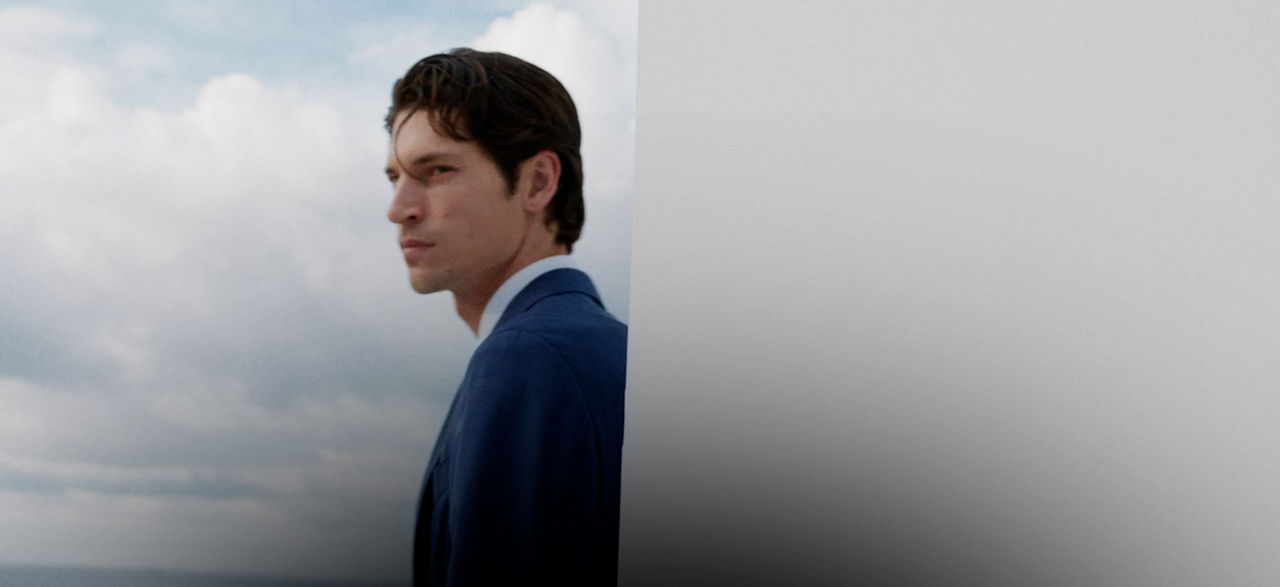 male model wearing BOSS Performance lightweight suit