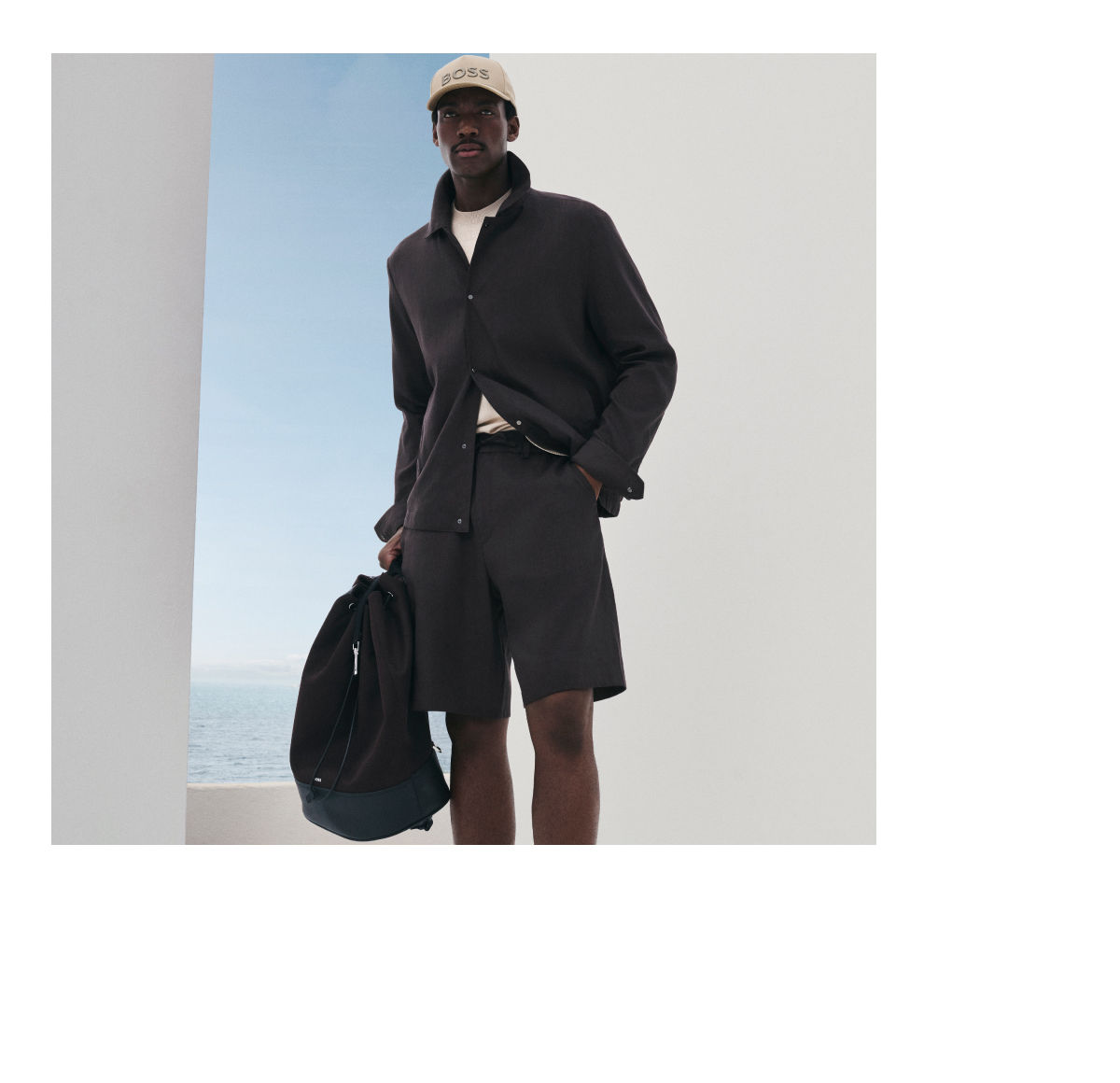 male model wearing BOSS Performance lightweight suit