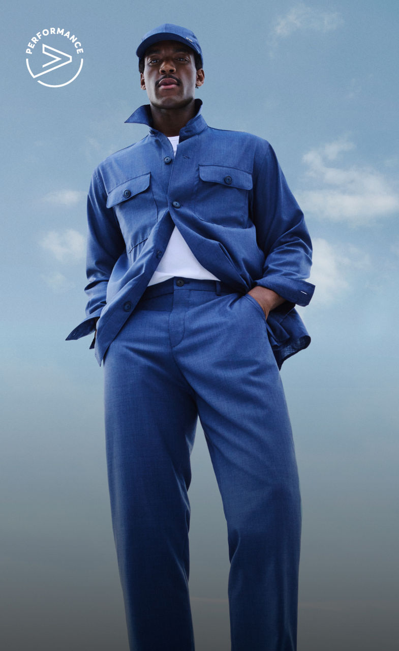 male model wearing BOSS Performance lightweight suit in open blue