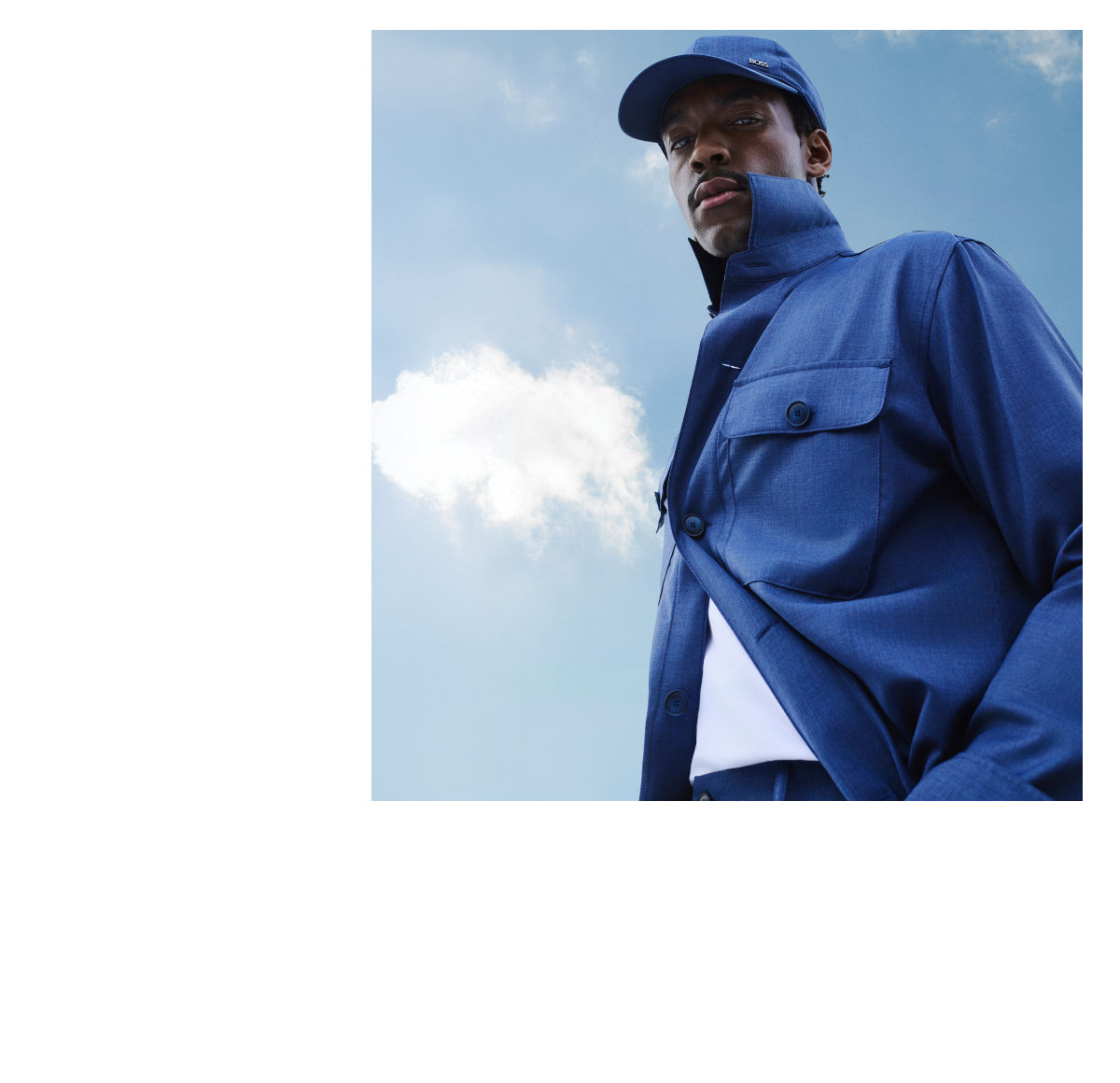 male model wearing BOSS Performance lightweight suit in open blue close up